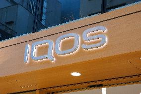 The iQOS logo